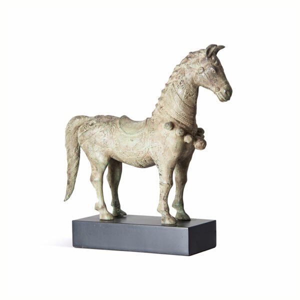 A beautiful bronze horse figure with aged cream patina